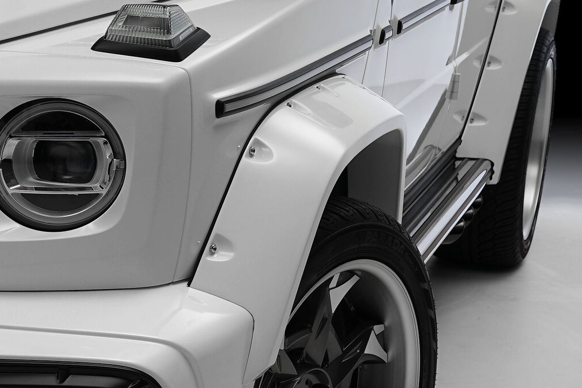 WALD Mercedes G63 W463A Black Bison wide arch package detail — ABS over fender with decorative screws