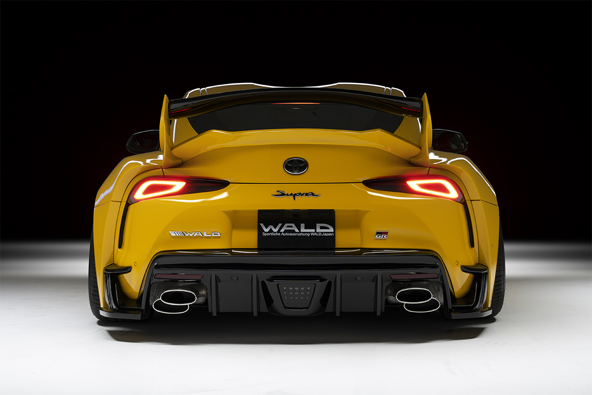 WALD Supra DB## head-on rear view with rear diffuser, twin stainless exhaust tips and 3D rear wing