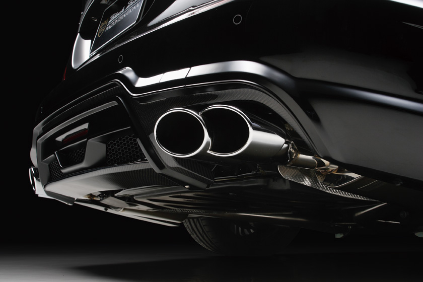 WALD Mercedes-Benz CLS C218 rear bumper spoiler detail with twin 240 mm stainless steel exhaust tips and carbon-look diffuser