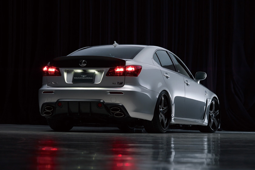 WALD Black Bison Lexus IS-F USE20 rear bumper spoiler and boot spoiler — rear three-quarter night studio view
