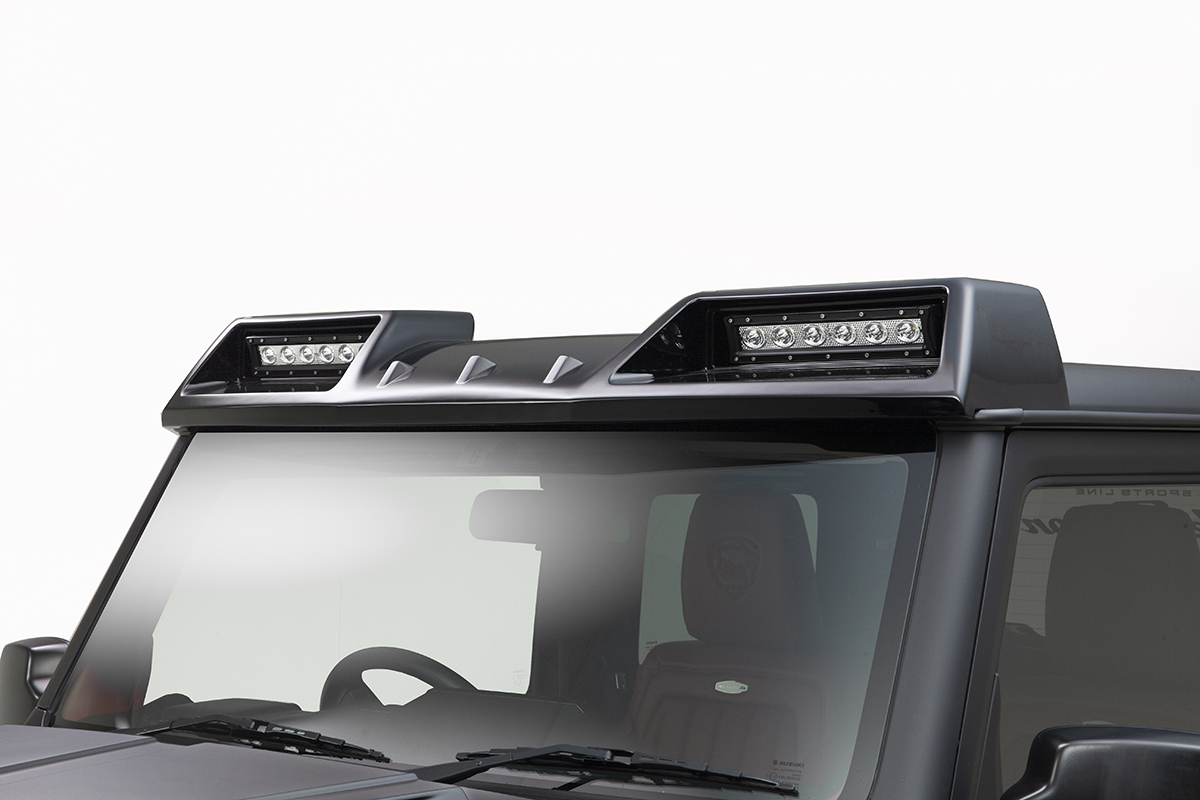 WALD Black Bison Edition Suzuki Jimny Sierra JB74W — detail of the roof spoiler with integrated LED light bars above the windscreen