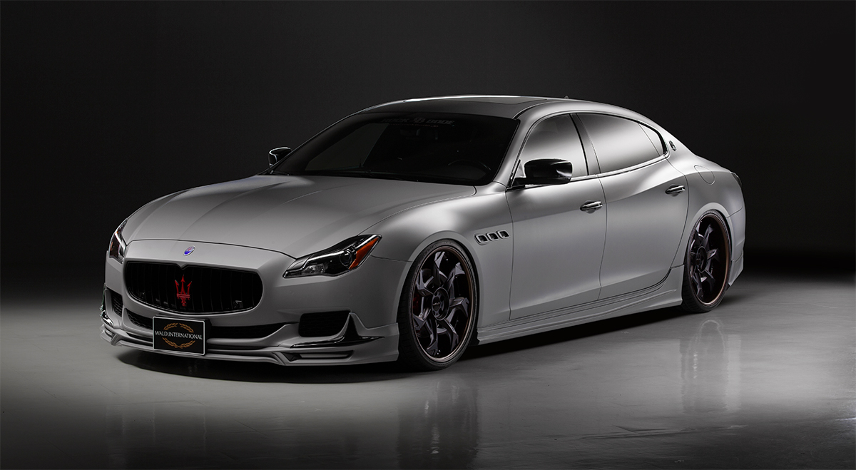 WALD Maserati Quattroporte body kit — matte grey Quattroporte with WALD Executive Line front spoiler and side skirts