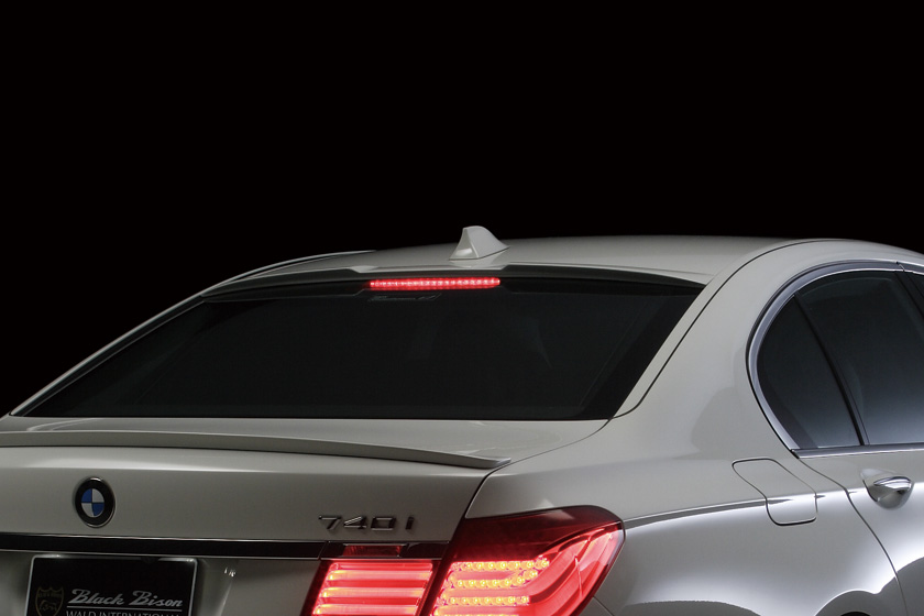 WALD BMW 7 Series F01 Black Bison roof spoiler detail with rear LED high-level brake lamp on silver 740i