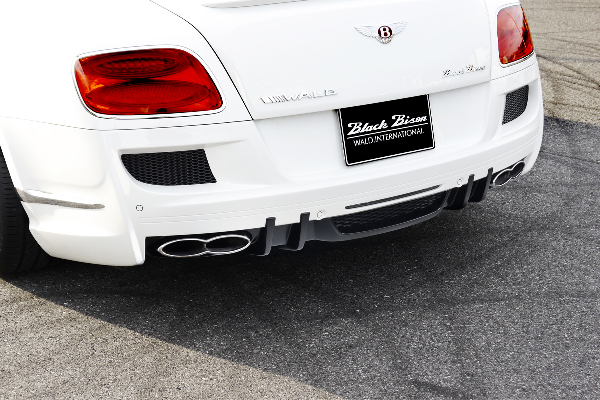 WALD Bentley Continental GT Black Bison rear bumper spoiler detail with mesh vents and quad exhaust tips