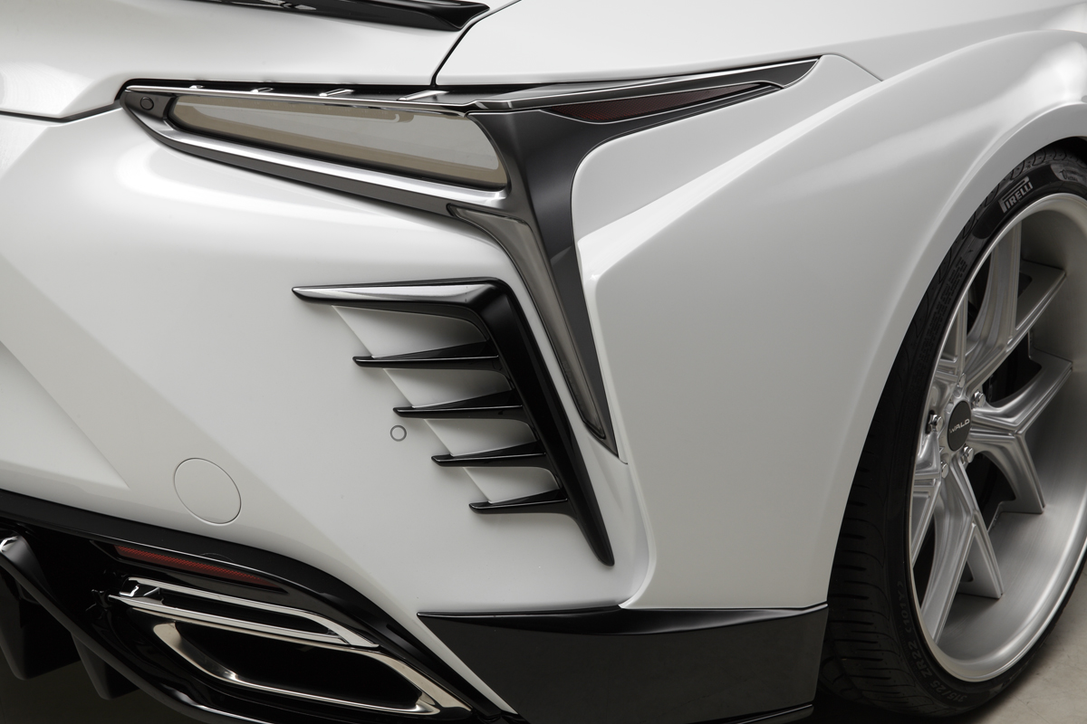 WALD Lexus LC500 rear fender air outlet fin detail beside the tail lamp on a white LC500