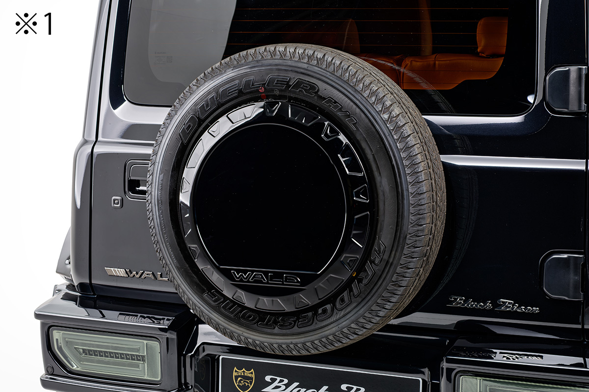 WALD Black Bison Edition Suzuki Jimny Nomade JC74W — WALD spare tyre cover fitted over the factory wheel cover with Black Bison badging