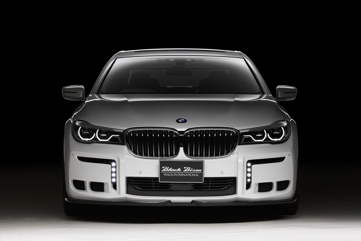 WALD BMW 7 Series G12 Black Bison head-on front view with LEDSL10P LED lamps in the WALD front lip spoiler