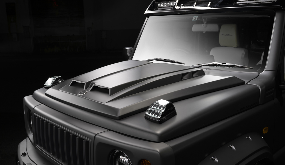 WALD Black Bison Edition Suzuki Jimny JB74W — detail of the add-on aero bonnet with bonnet scoop cover and WALD metal bonnet badge