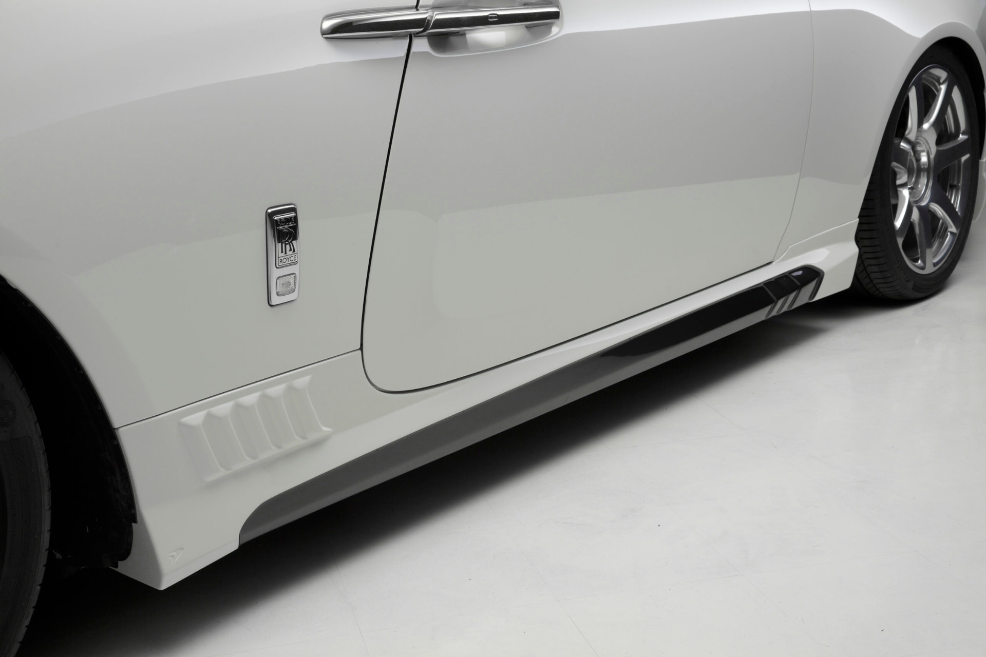 WALD Black Bison Rolls-Royce Wraith side skirt and side flap detail