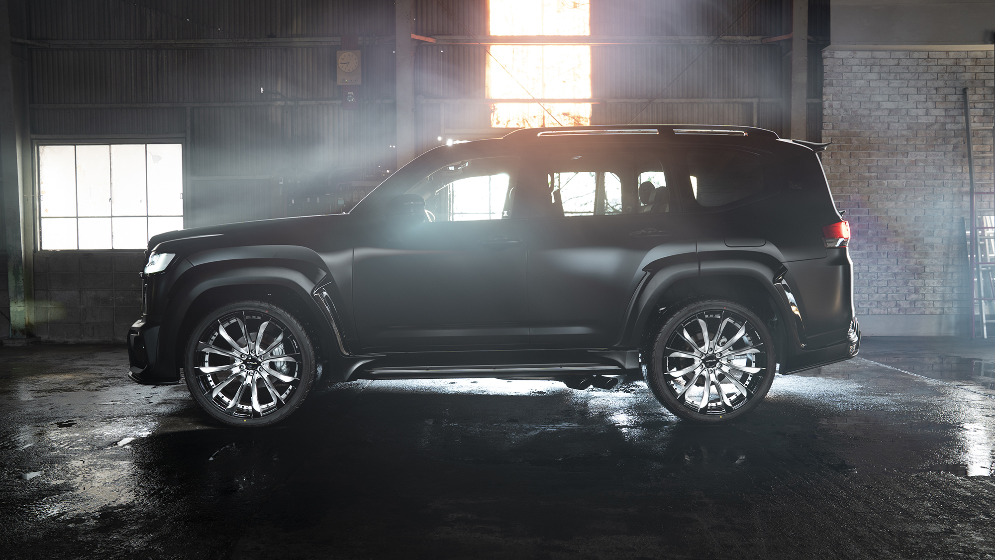WALD Black Bison Land Cruiser 300 ZX full side profile with 24-inch WALD wheels and side steps