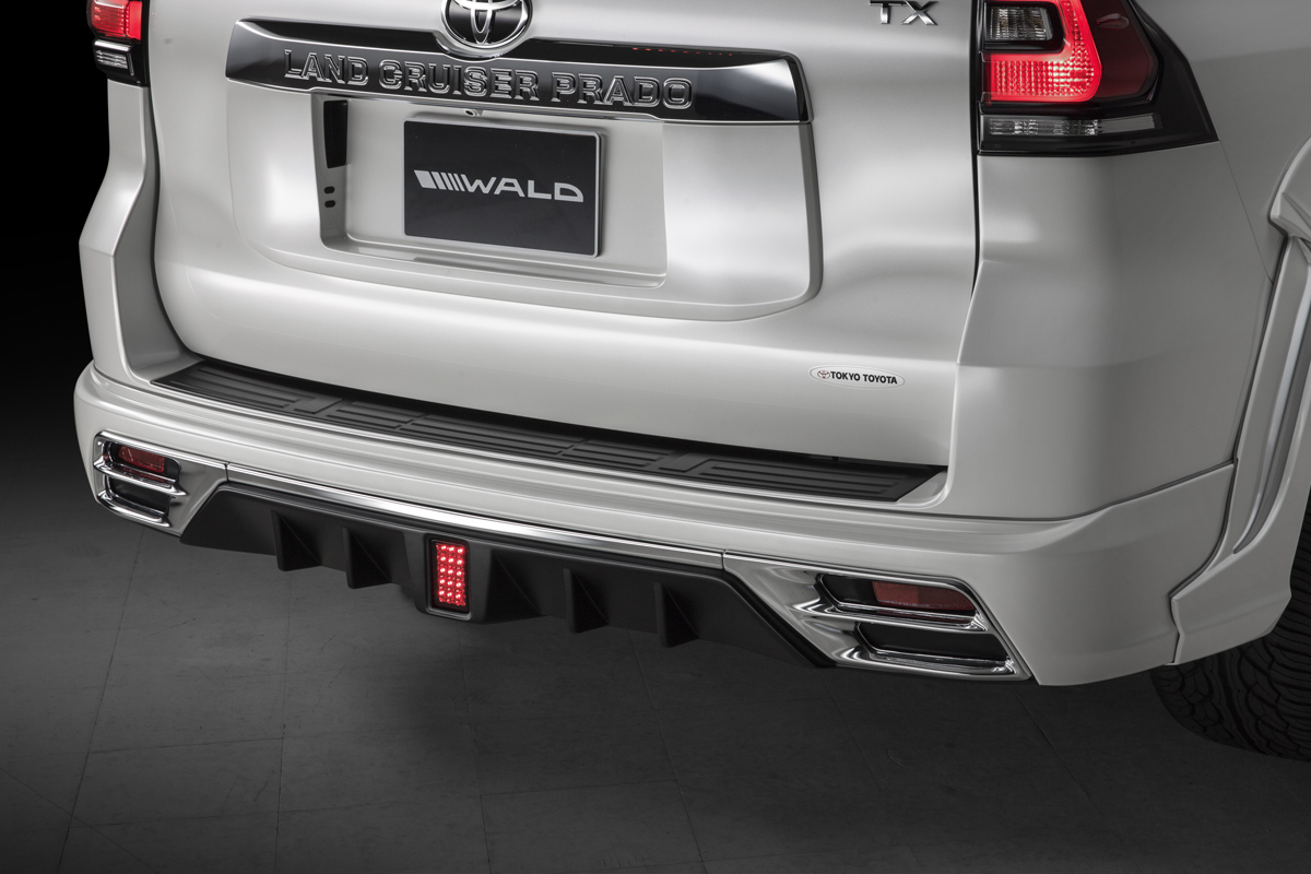 WALD Sports Line Prado 150 rear skirt detail with chrome garnish, reflectors and dual oval 117W exhaust tips