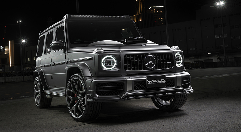 Mercedes G63 AMG W463A WALD Sports Line front three-quarter night shot on location