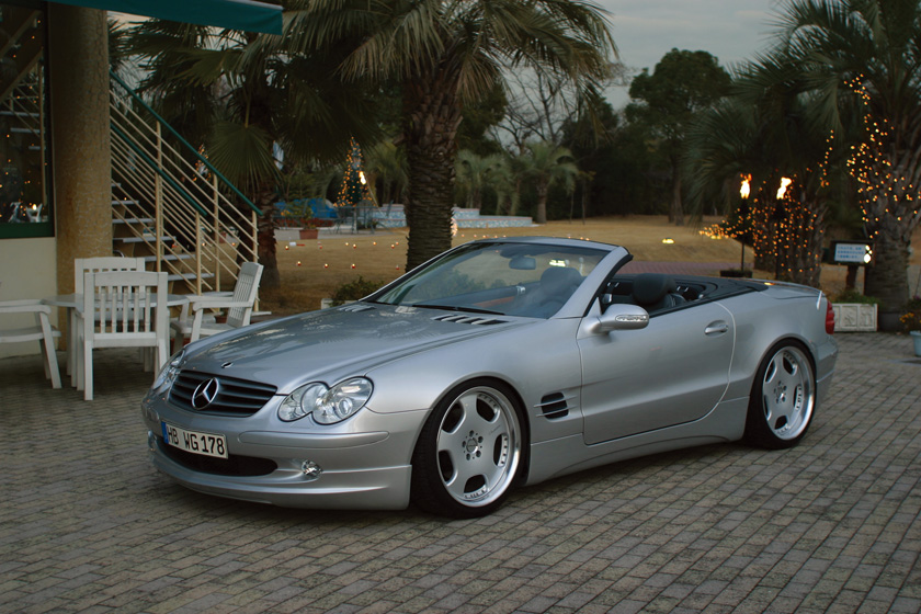 WALD Mercedes-Benz SL-Class R230 front three-quarter view with WALD Executive Line bodykit at dusk