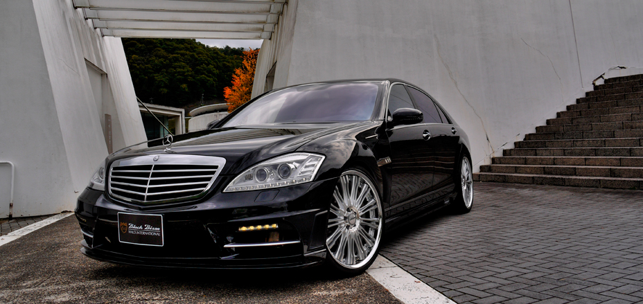 WALD Black Bison Mercedes-Benz S-Class W221 facelift — black S-Class with WALD front bumper spoiler and forged wheels