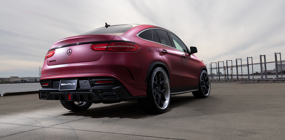 WALD Sports Line Mercedes GLE Coupe C292 rear three-quarter on location showing rear skirt, chrome garnish and coupe roofline