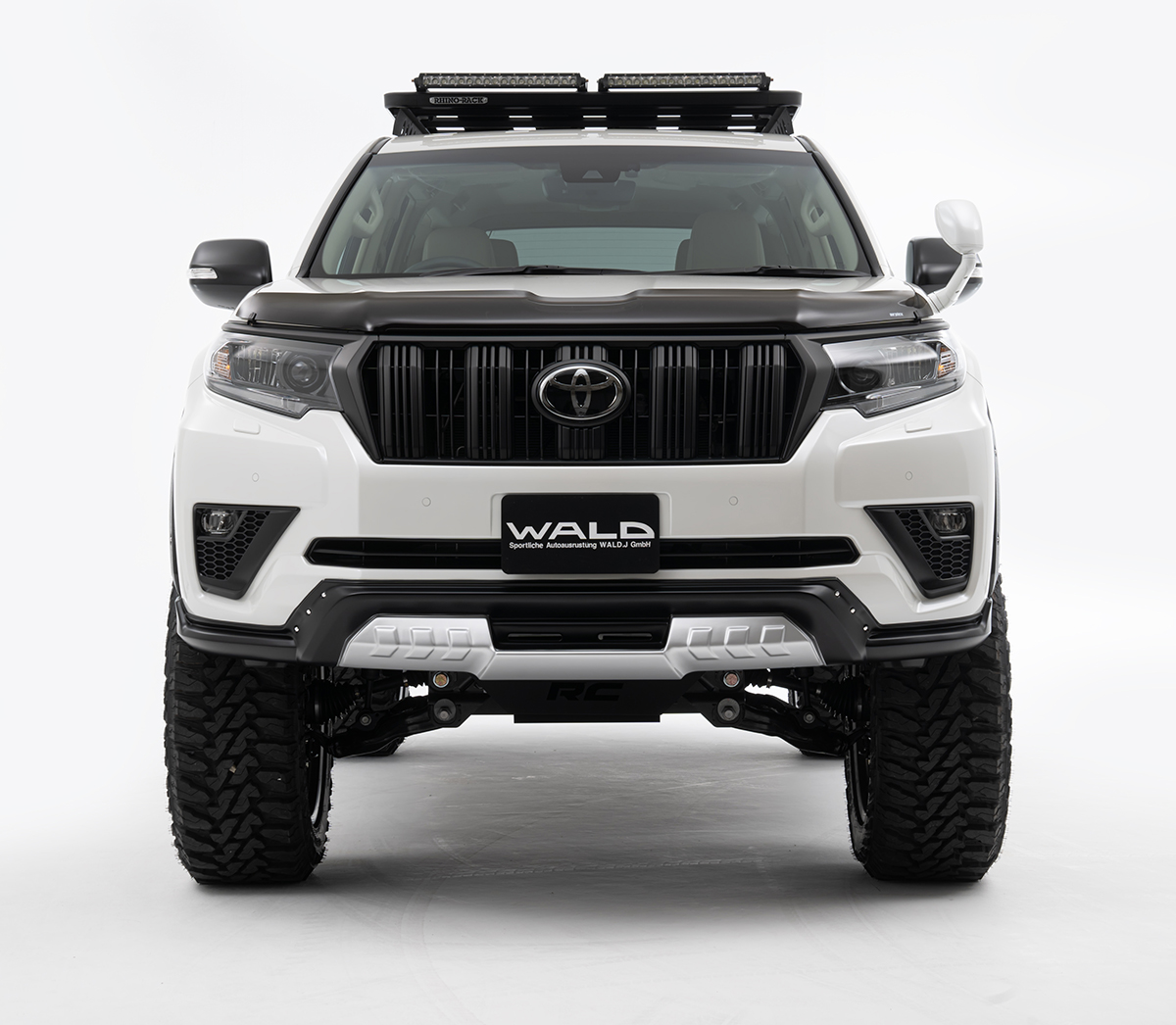 WALD Desert Line Land Cruiser Prado head-on front studio view with ABS front spoiler and dummy rivets