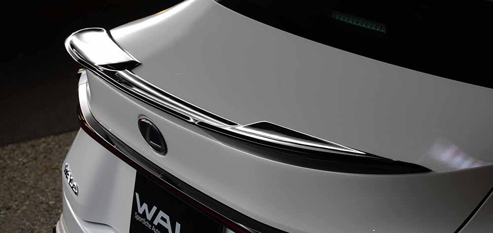WALD Lexus IS boot spoiler detail — plated boot spoiler on white Lexus IS