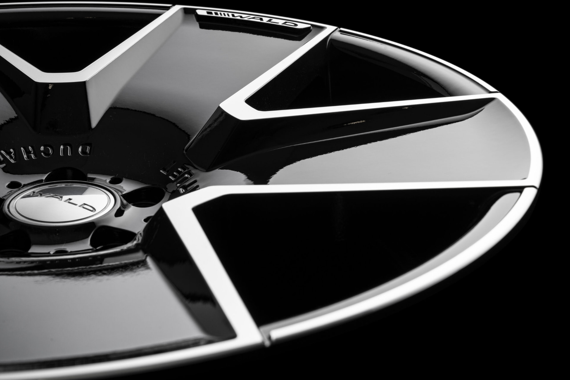 Close detail of the WALD Duchatlet IV D41C Black Polish spoke faces and WALD lettering