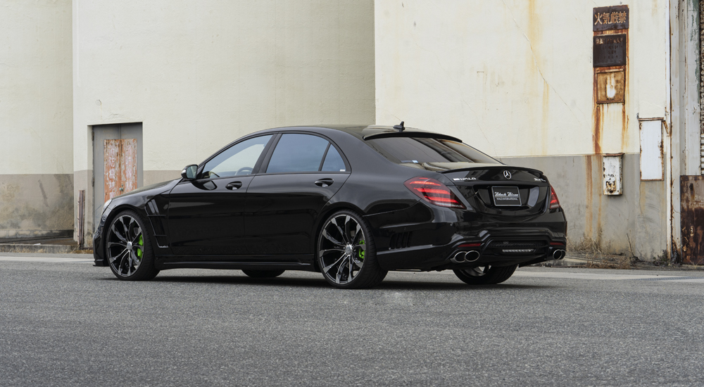 Black WALD Black Bison Mercedes-Benz S-Class W222 rear three-quarter view with boot and roof spoilers
