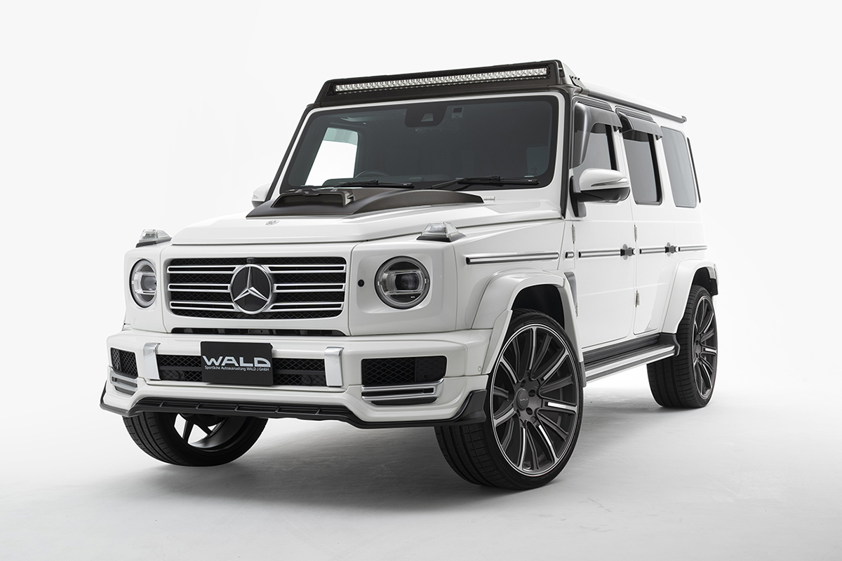 WALD Mercedes G-Class W463A Sports Line front studio view — white G550 with ABS front spoiler and Panamericana grille set
