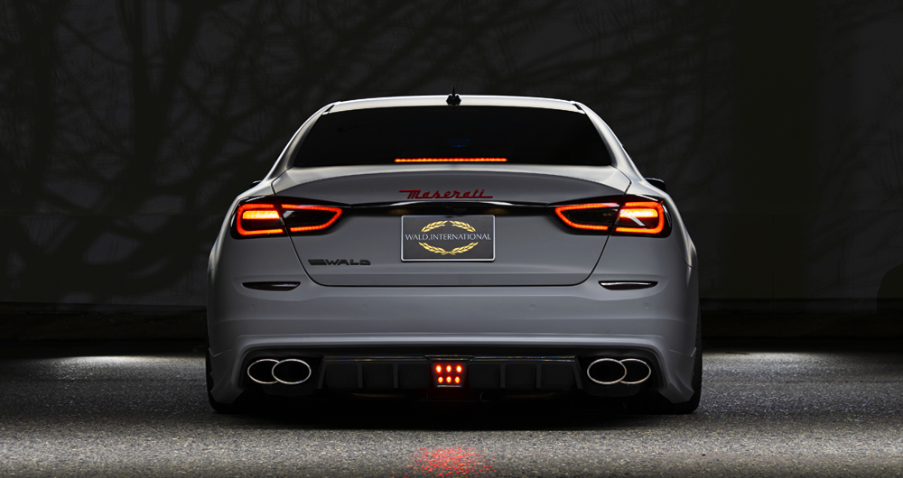 Rear view of the WALD Maserati Quattroporte showing diffuser, quad exhaust tips and red LED lamp