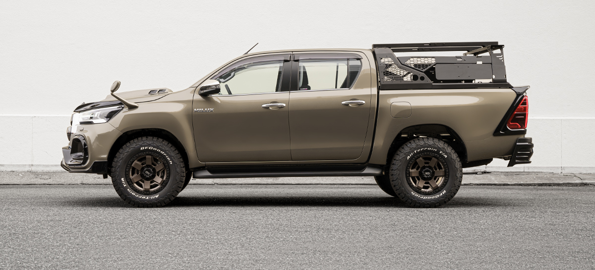 Side profile of the WALD Black Bison Toyota Hilux GUN125 M/C after showing wide body proportions