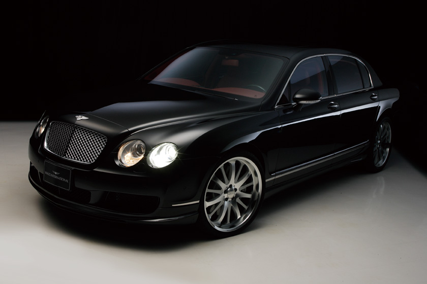 WALD Bentley Continental Flying Spur Executive Line 2005–2008 front three-quarter view with headlamps illuminated