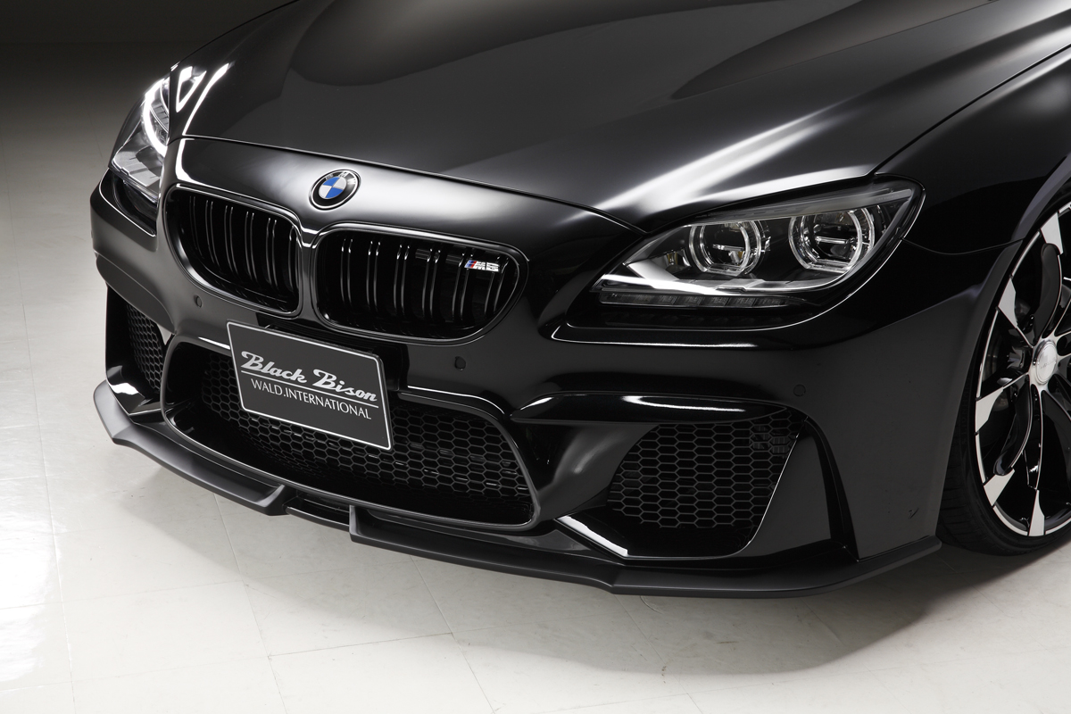 WALD Black Bison BMW 6 Series Gran Coupe front bumper detail showing WALD front lip spoiler and mesh grille