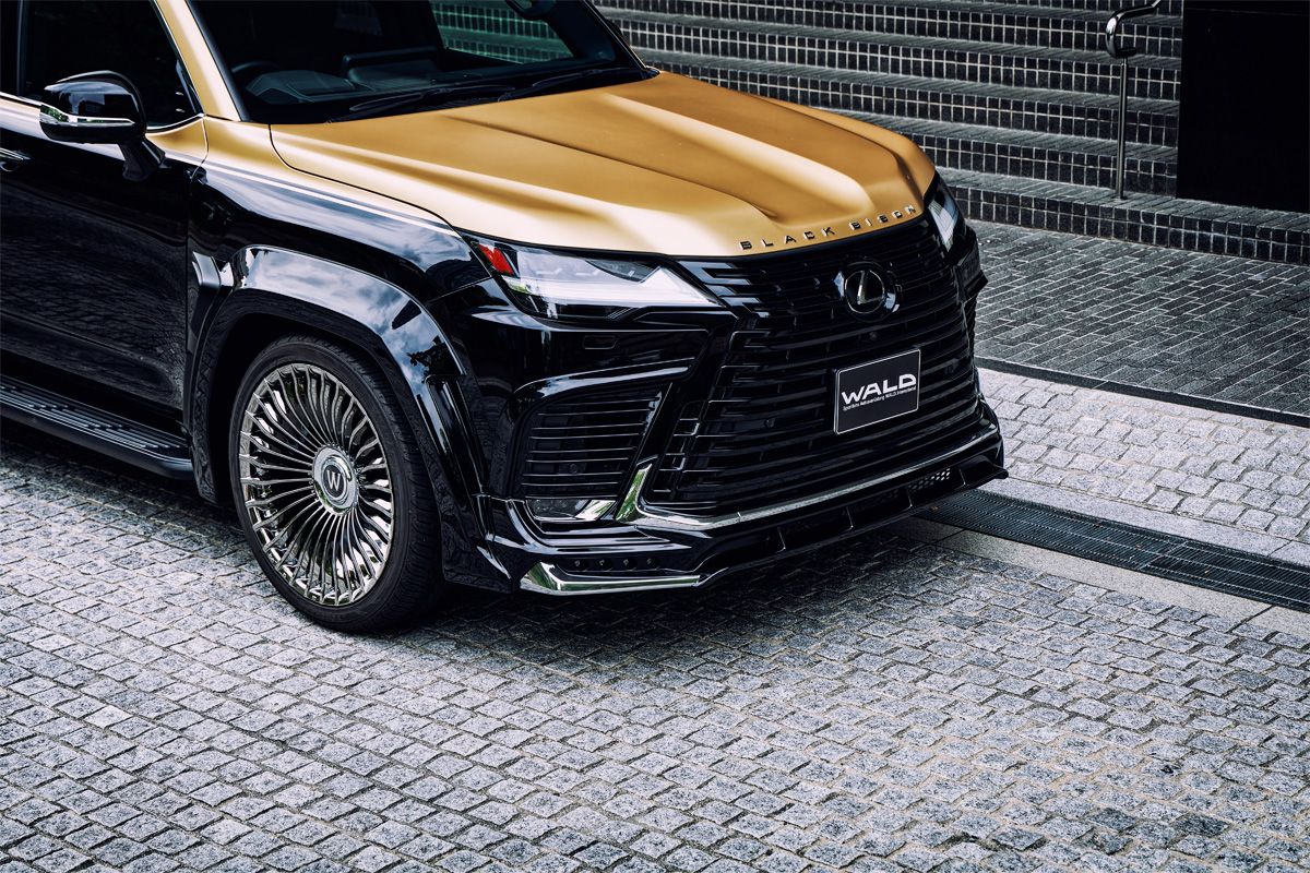 Front detail of a WALD Black Bison Lexus LX600 fitted with 24 inch WALD RENOVATIO II R21C wheels