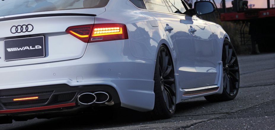 WALD Audi A5 Sportback rear quarter detail — WALD rear bumper skirt, side skirt and twin exhaust tips