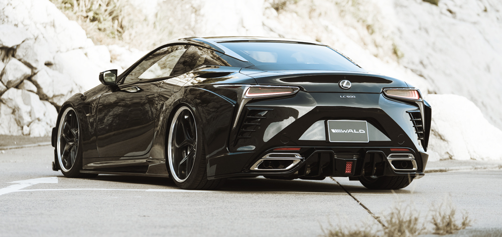 WALD Lexus LC500 rear three-quarter view showing rear diffuser, LED stop lamp and quad exhaust tips