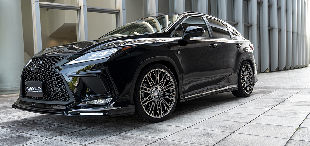 WALD Sports Line Lexus RX300 F SPORT front three-quarter view with WALD front spoiler and side skirts