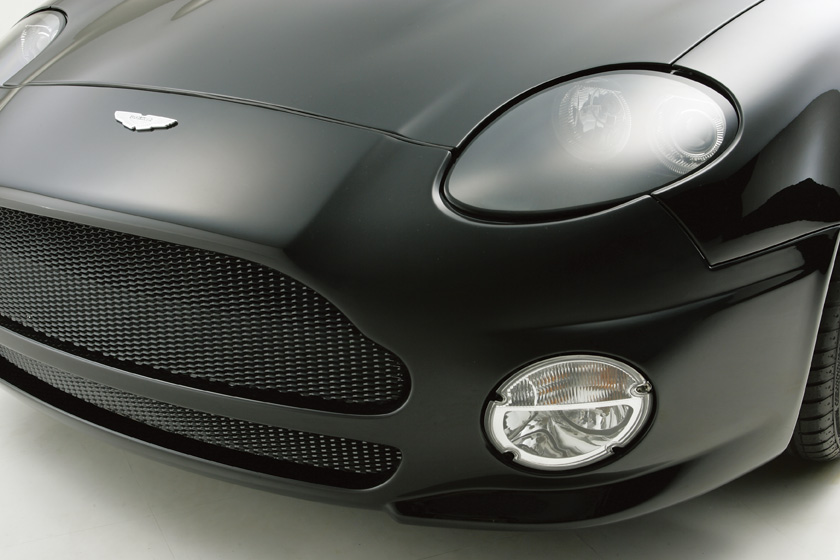 WALD Aston Martin DB7 front bumper detail — WALD Sports Line front bumper spoiler, mesh grille and fog lamp close-up