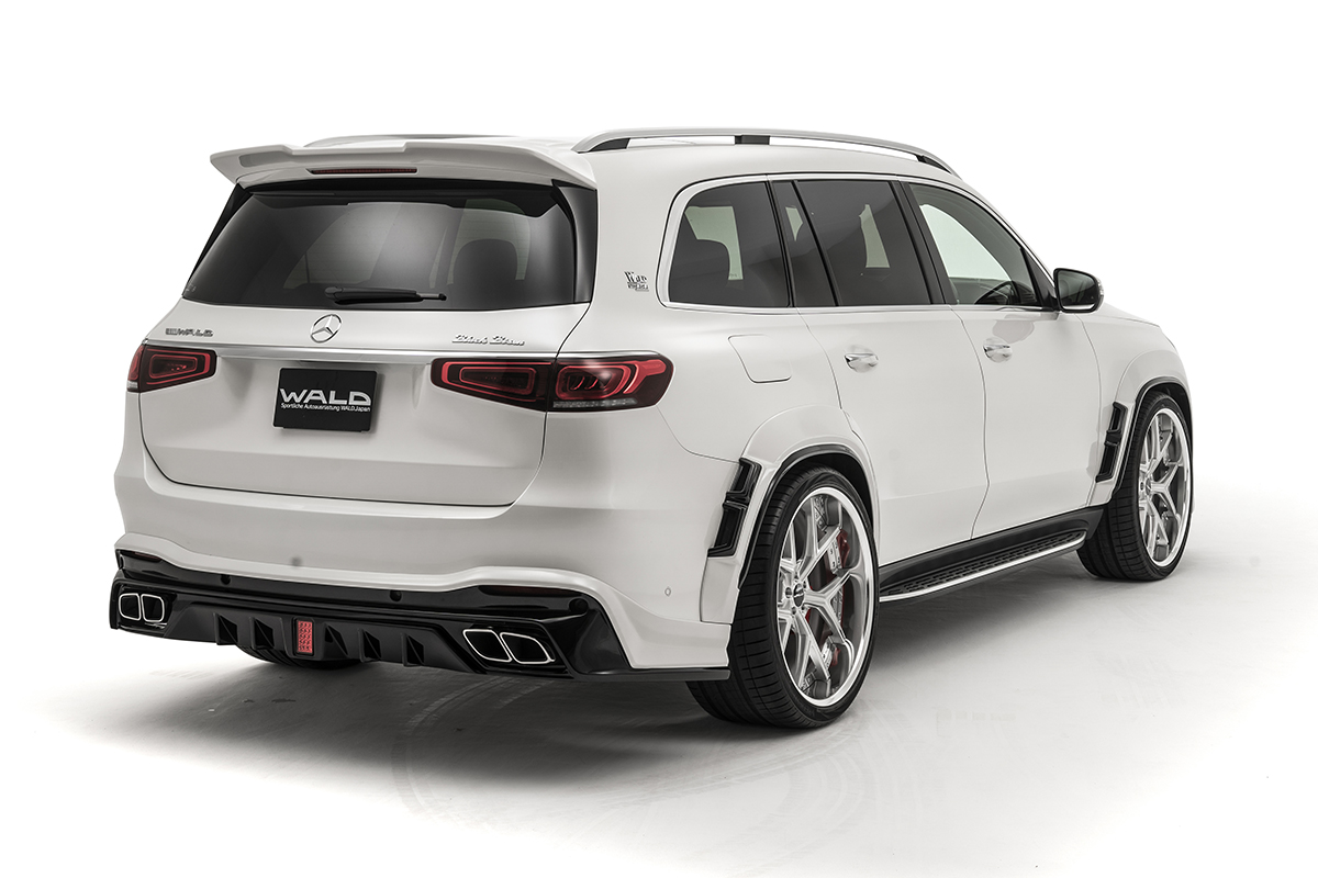 WALD Black Bison GLS X167 rear three-quarter view with diffuser-shaped rear skirt and quad exhaust tips