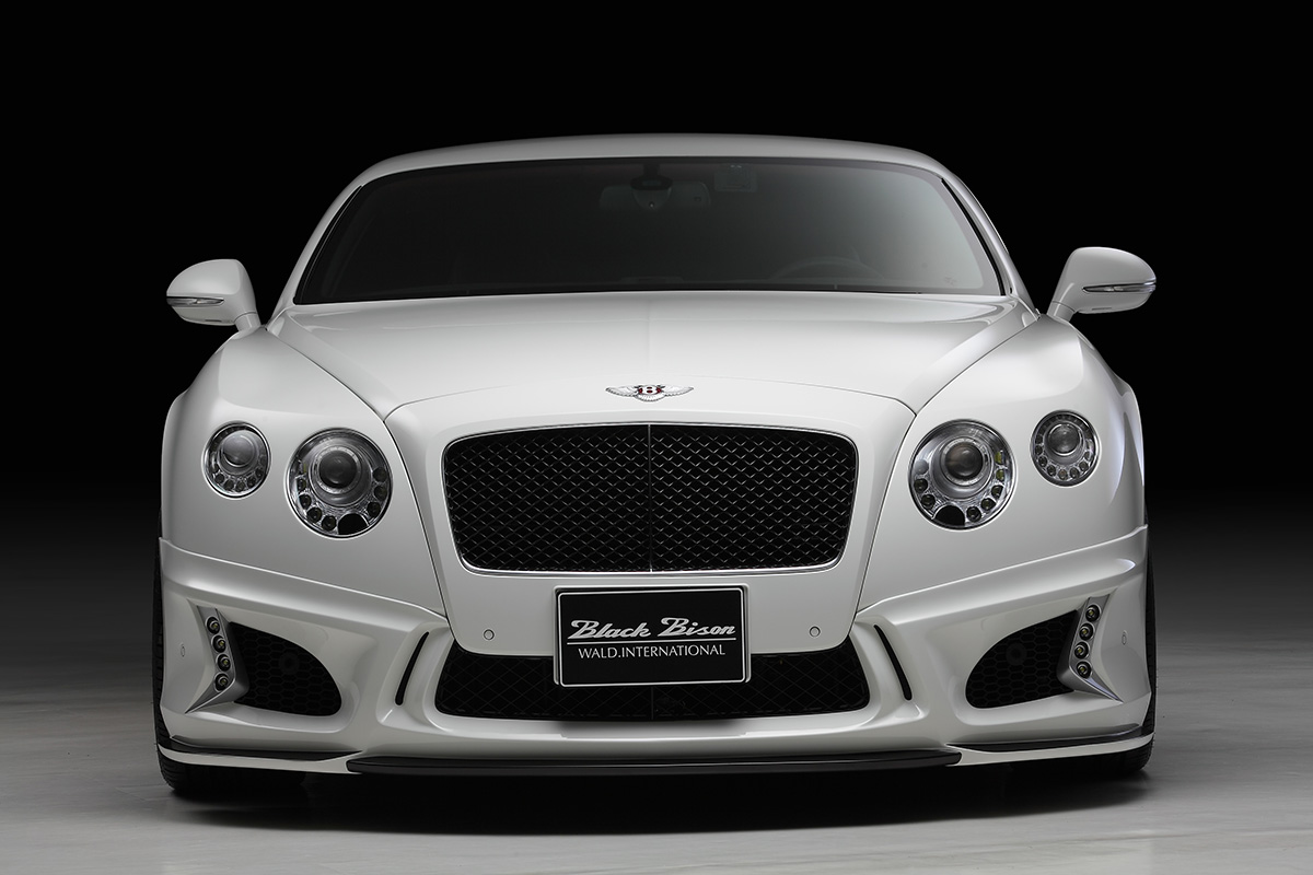 WALD Bentley body kit — white Bentley Continental GT Black Bison with WALD front bumper and canards