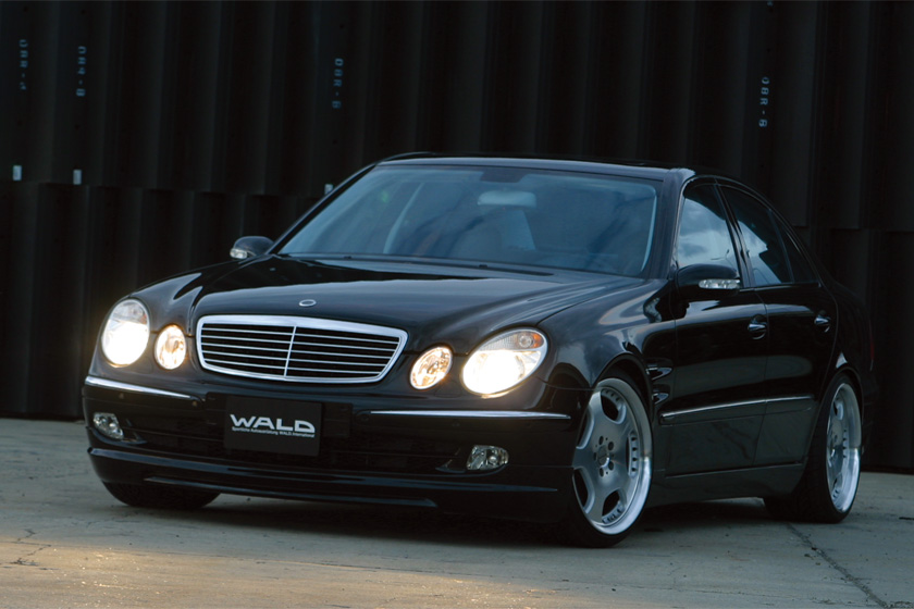 Mercedes-Benz E-Class W211 WALD Executive Line — black W211 saloon with WALD front spoiler and forged wheels