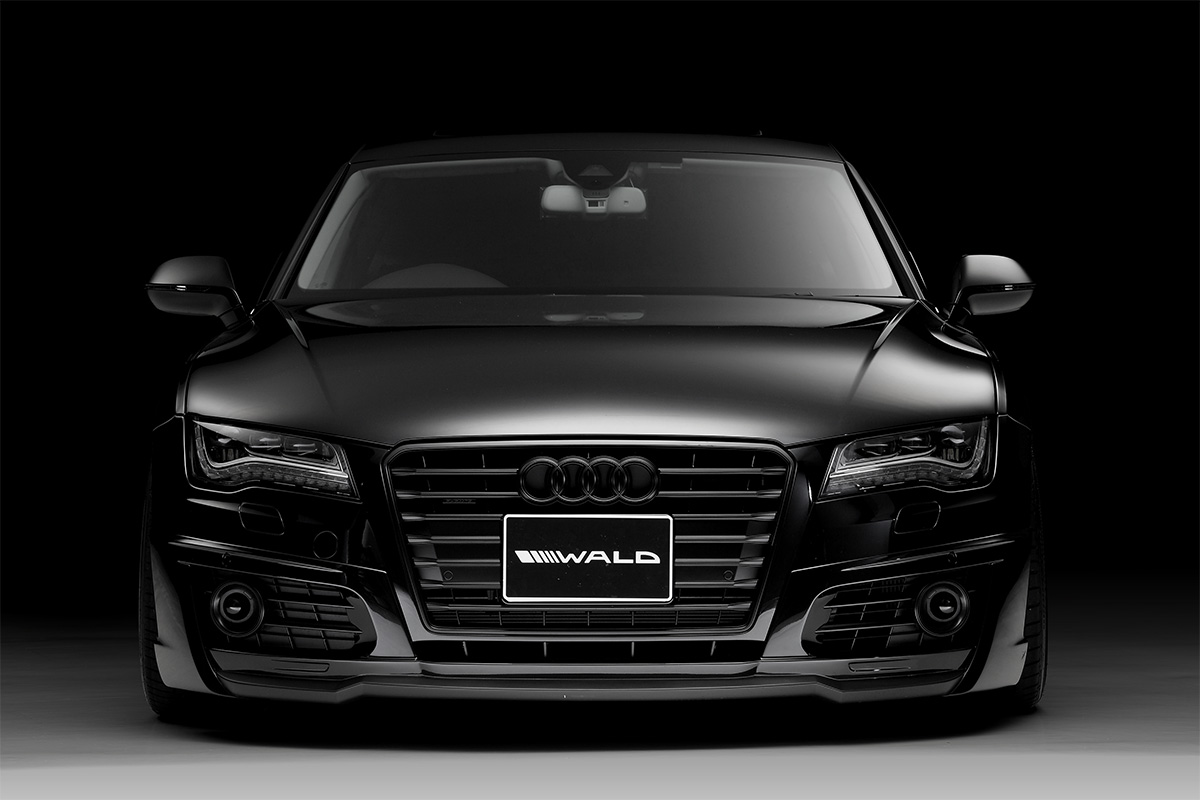 WALD Audi body kit — black Audi A7 front view with WALD front bumper, lower lip and WALD number plate