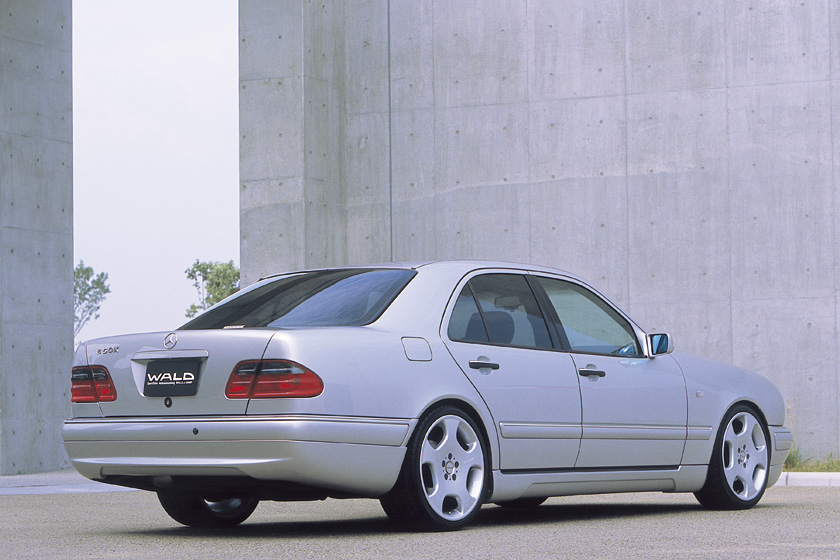 Mercedes-Benz E-Class W210 WALD Executive Line rear three-quarter view with WALD rear skirt