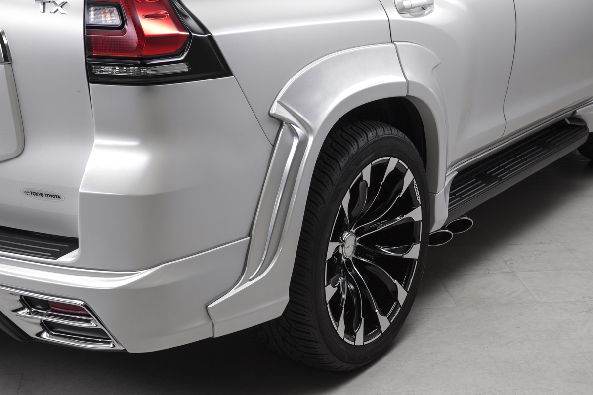 Silver WALD Sports Line Prado 150 rear over-fender, WALD wheel and rear skirt detail